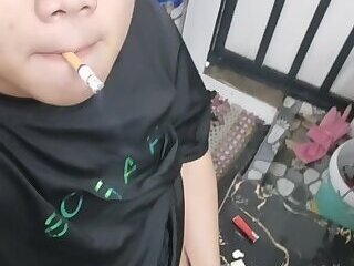 asian guy jerking off and smoking