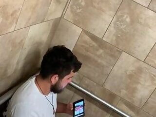 Jacking off in public bathroom